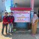 Dorong Keterbukaan Informasi, Mahasiswa KKN Pasang Papan Informasi di Desa Kanaungan.