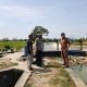 Bhabinkamtibmas Turun Langsung Cek Irigasi, Pastikan Air Tetap Mengalir ke Sawah Petani Sidrap